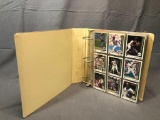 Assorted Baseball Cards in Album