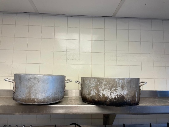 Two Stock Pots, One Bottom is Warped