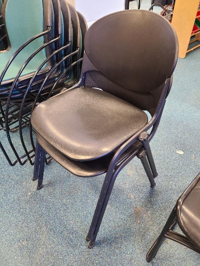 Two Matching Stack Chairs