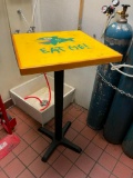 High Top Table: Single Pedestal Base, Yellow HD Lacquer Top w/ Eat Me Fish Logo, 48in T 24in