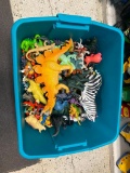 Tote Full of Dinosaur Figurines