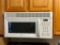 HOTPOINT GE Over-The-Range Microwave - Model: RVM1535DM2WW Mfg. June 2012