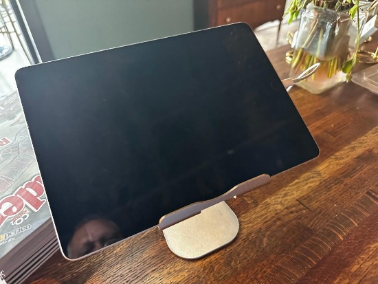Apple iPad Model A2602 (No Case, No Type Cover, Connected to Security Cable)