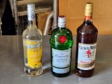 3 Sealed 1 Liter Bottles of Liquor, Cruzan Mango Rum, Tanqueray Dry Gin, Captain Morgan Spiced Rum