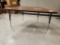 4-Leg Woodgrain Trapezoid Tables 57