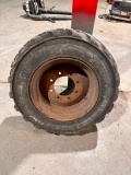 Old Bobcat Tire and Rim