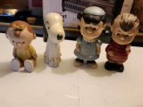 Lot of 4 Peanuts Snoopy Porcelain Figurines
