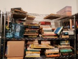 Assorted Books on Top Three Shelves