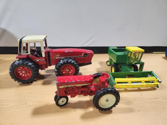 Three Farm Toys, International, Farmall and John Deere