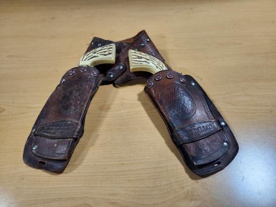 Pair of Gunsmoke Toy Cap Gun Six Shooters w/ Holsters, Embossed GUNSMOKE