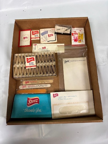 Box of Storz Memorabilia, NOS Case of Matches, Stationary, Coasters, Fly Fishing Flies, Nail Files &