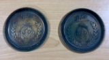 Two Embossed Metal Storz Beer Coasters