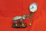 Linder Elephant Swinging Clock