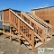 2 SETS. STAIRS, WITH LANDING, PRESSURE TREATED WOOD CONSTRUCTION