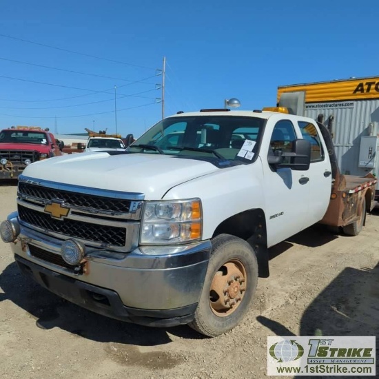 2012 CHEVROLET SILVERADO 3500HD, 6.6L DURAMAX, 4X4, DUALLY, CREW CAB, 9FT 6IN FLAT BED. WEBASTO HEAT