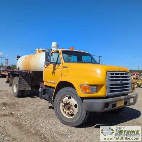 1997 FORD F700, V8 GAS ENGINE, AUTOMATIC TRANSMISSION, 27500 GVWR, 1400 GALLON STEEL VACUUM TANK. NO