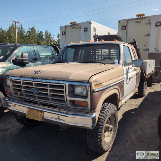 1985 FORD F-250, 6.9L DIESEL, 4-SPEED MANUAL TRANSMISSION, 4X4, EXTENDED CAB, 8.5FT FLATBED WITH GOO
