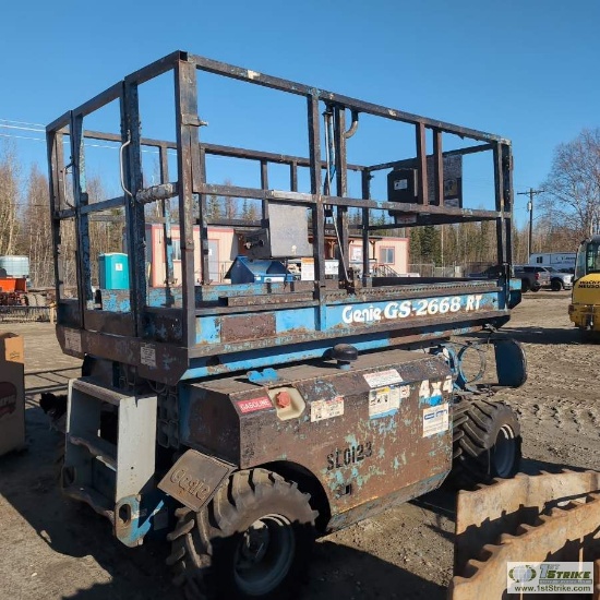 SCISSOR LIFT, GENIE GS-2668 RT, 4X4, 3CYLINDER GAS OR LP ENGINE, 4FT 10IN WIDE X 8FT 9IN LONG PLATFO