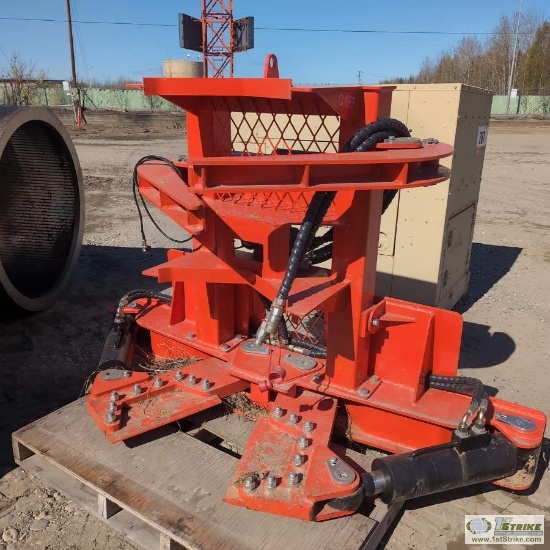 SKIDSTEER ATTACHMENT, TREE SHEAR. ITEM APPEARS UNSUDE