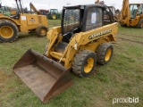 JOHN DEERE 240 SKID STEER powered by John Deere diesel engine, equipped with rollcage, auxiliary hyd