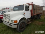 1990 INTERNATIONAL STAKE TRUCK VNN/A equipped with stake rack body, 336,000 miles.