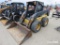 NEW HOLLAND LS180 SKID STEER SN:007886 powered by diesel engine, equipped with rollcage, auxiliary h