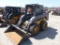 NEW HOLLAND LS170 SKID STEER SN:170109 powered by diesel engine, equipped with rollcage, auxiliary h