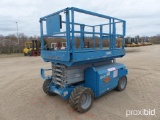 GENIE GS-3268 RT SCISSOR LIFT SN:GS6807-47932 4x4, powered by gas engine, equipped with 32ft. Platfo