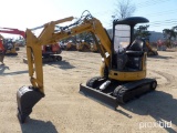 CAT 303CCR HYDRAULIC EXCAVATOR SN:212 powered by Cat diesel engine, equipped with OROPS, front blade