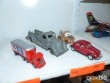 (2) METAL TOY TRUCKS, (1) PLASTIC VW BUG, (1) PAPER TOW TRUCK COLLECTIBLE TOY