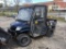 CUSHMAN 1600XD UTILITY VEHICLE powered by gas engine, equipped with EROPS, utility dump body. BOS ON