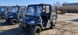CUSHMAN 1600XD UTILITY VEHICLE powered by gas engine, equipped with EROPS, utility dump body.