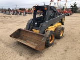 NEW HOLLAND LS180 SKID STEER powered by diesel engine, equipped with rollcage, high flow auxiliary h