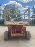 SNORKEL 3284 SCISSOR LIFT SN:FB00198 4x4, powered by gas engine, equipped with 32ft. Platform height