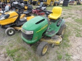 JOHN DEERE L130 LAWN & GARDEN TRACTOR powered by gas engine, equipped with cutting deck.