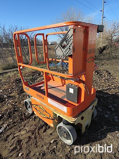 2014 JLG 1230ES SCISSOR LIFT SN:0200226611 electric powered, equipped with 12ft. Platform height, sl