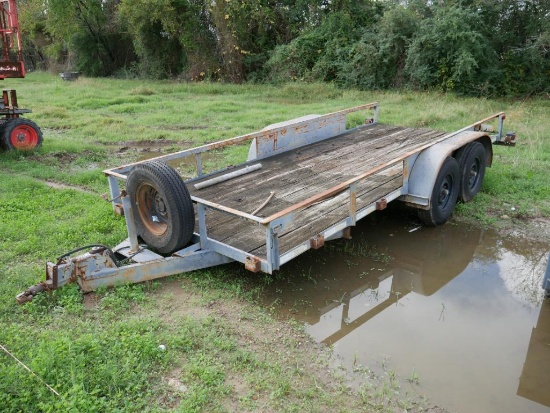 16FT. UTILITY TRAILER VN:N/A equipped with 16ft. Deck, 7.00-15 tires, tandem axle.