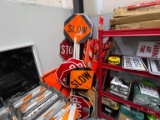 TRAFFIC CONTROL SIGNS IN CORNER, STOP SIGNS, FLAGGER SIGNS, MEN AT WORK SUPPORT EQUIPMENT