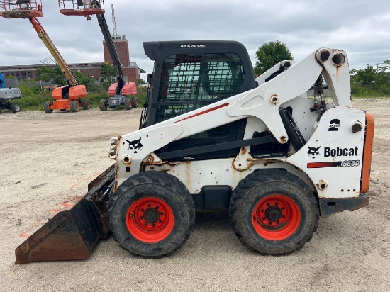 BOBCAT S650 SKID STEER SN:19754 powered by diesel engine, equipped with EROPS, auxiliary hydraulics,