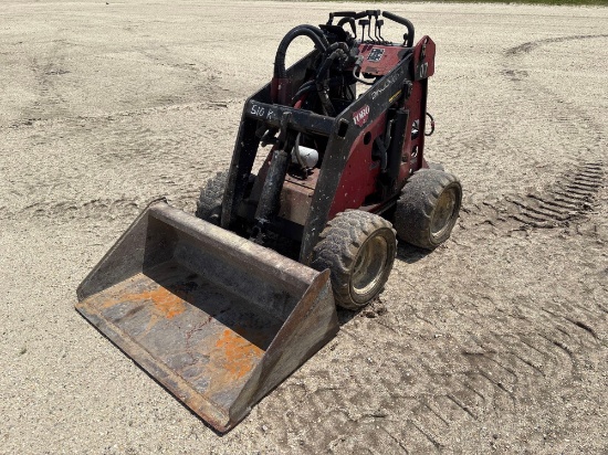 2010 TORO MINI TIRED LOADER powered by Kohler Command Pro gas engine, 20hp, equipped with auxiliary