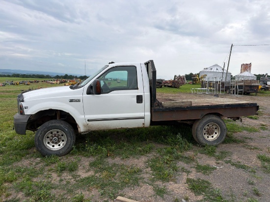 1999 FORD F350 FLATBED TRUCK VN:1TFSF31F7XEA01171 4x4, powered by Power Stroke 7.3 diesel engine,