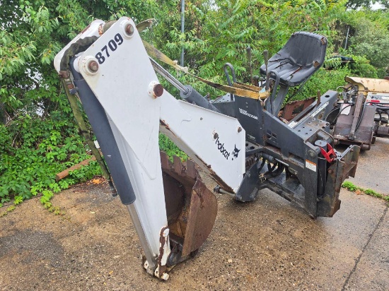 BOBCAT 8709 BACKHOE SKID STEER ATTACHMENT. Located: 18 Central Ave., Hauppauge, New York 11788