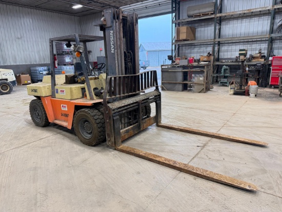 NISSAN VF05H70V FORKLIFT SN:VF05-001065 powered by diesel engine, equipped with OROPS, 12,400lb lift