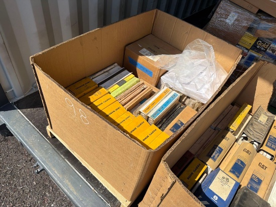 CRATE OF ASSORTED EQUIPMENT MANUALS: CAT, KOMATSU, JD, TEREX, CAT 980M, MISC SUPPORT EQUIPMENT