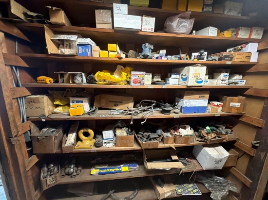 SHELF OF MISC TRUCK PARTS SUPPORT EQUIPMENT