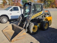 NEW HOLLAND L218 SKID STEER SN:NFM413030 powered by diesel engine, equipped with EROPS, air, heat,