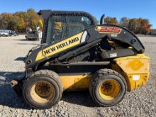NEW HOLLAND L225 SKID STEER SN:479298 powered by diesel engine, equipped with rollcage, auxiliary