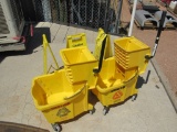 Mop Buckets and Caution Signs-