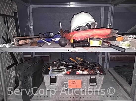 Lot on shelf of various hand tools, tire plug kit, ladder levelers, hand saws, grease gun, etc.