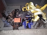 Lot on shelf of various jack, ball hitches, tow straps, lug nuts